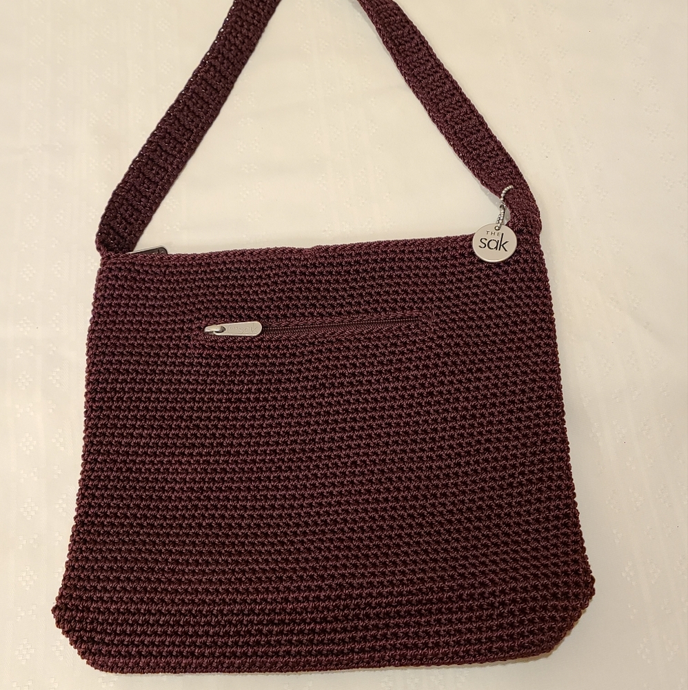 The SAK purple woven shoulder bag